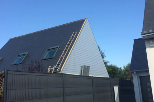 Pose d'un bardage bois extérieur avec isolant sur habitation