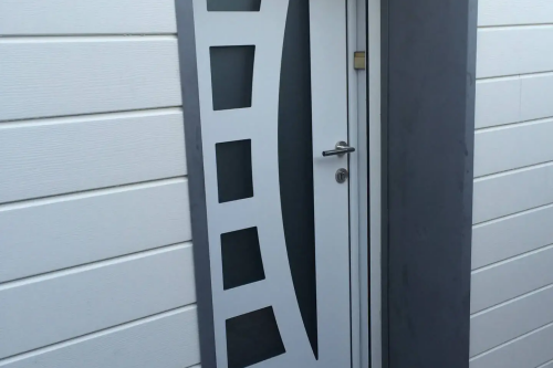 Pose d'un bardage bois extérieur avec isolant sur habitation