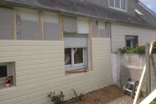 Pose d'un bardage composite extérieur sur façade