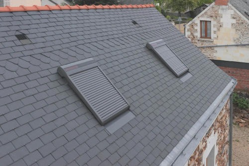 Pose d'une toiture complète avec fenêtres de toit de type Velux